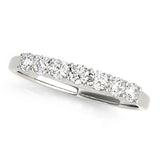Shared Prong Seven Diamond Wedding Band