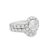 Stunning 2 3/4CTW Certified Diamond Halo Wedding Set