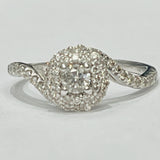 This gorgeous engagement ring features a 1/2ctw in natural d...