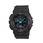 Black Casio G-Shock watch with blue digital display on a white background