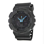 Black G-Shock watch with blue digital display on a white background