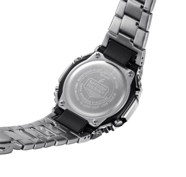 Close-up of a Casio watch with metal band on a white background