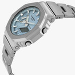 Silver Casio watch with blue face on a white background