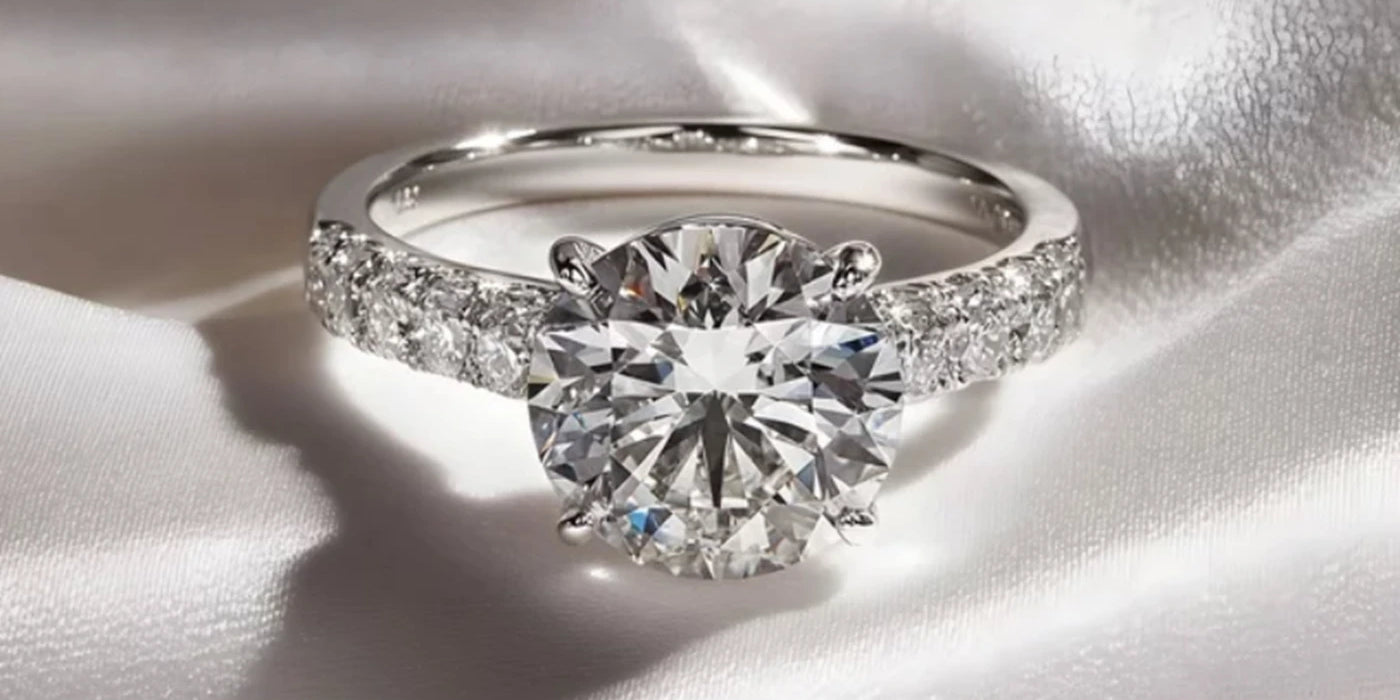 Diamond ring on a white satin background