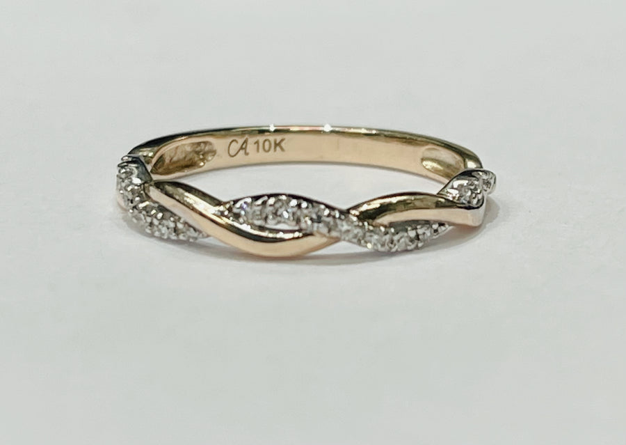 This stunning twist ring is perfect to add to your stackable...