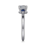Gabriel & Co. Jeanne ER15603R4W44SA – 14K White Gold Round Three-Stone Sapphire and Diamond Engagement Ring