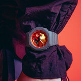 Casio G‑Shock GA2100FL‑8A – Flames of Color Series Analog‑Digital Octagonal Watch with Orange Dial & Gray Resin Band