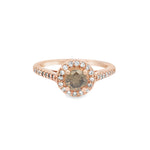 A rose gold engagement ring with a central chocolate diamond and accenting white round diamonds.