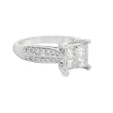 Elegant Accented Princess Cut Quad Engagement Ring