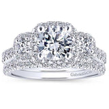 Gabriel & Co. Lavender ER12810R4W44JJ – 14K White Gold Three-Stone Halo Round Diamond Engagement Ring