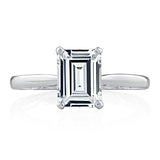 Emerald diamond solitaire with petal detail in under gallery