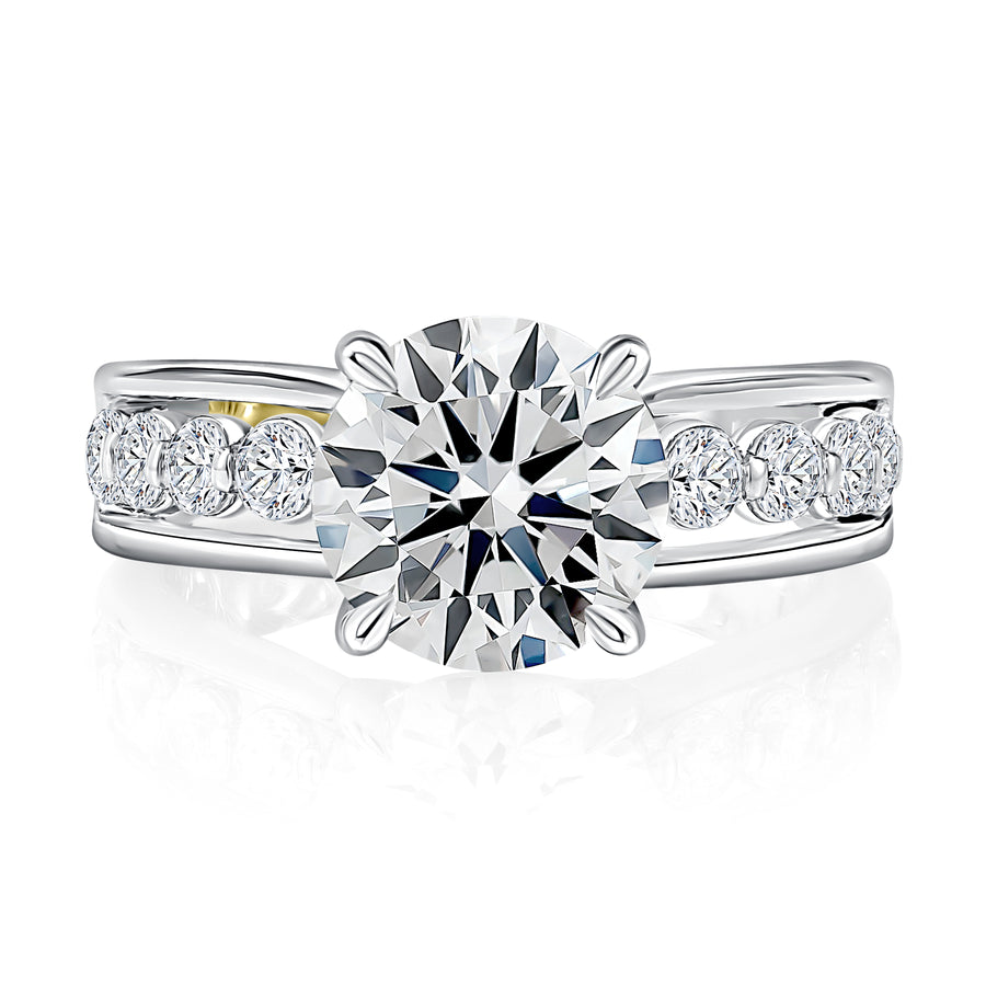 Round Center Diamond Engagement Ring with Channel Set Diamonds and Quilts® Interior