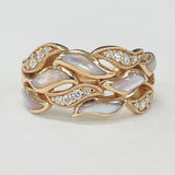 Flowing Mother Of Pearl And Diamond Fashion Ring