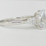Romance - Three Stone Modern Style Pear And Oval Diamond Setting