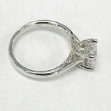 Romance - White Gold Solitare W/ Diamond Accented Head Setting