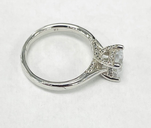 Romance - White Gold Solitare W/ Diamond Accented Head Setting