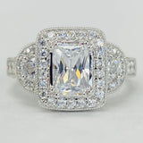 Romance - Three Stone Detailed Halo Diamond Setting