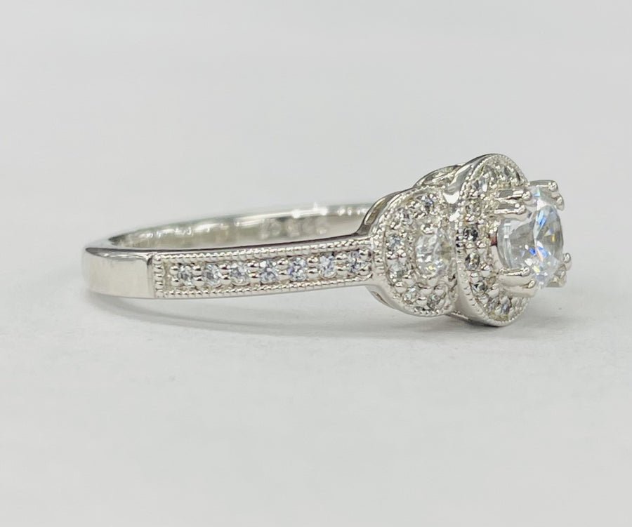 Romance - Simple Three Stone Halo Diamond Setting