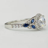 Romance - Floral Nature Diamond And Sapphire Halo Setting
