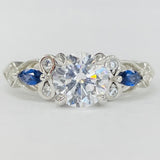 Romance - Floral Inspired Sapphire And Diamonds Setting