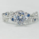 ArtCarved - Floral Inspired Diamond And Sapphire Setting