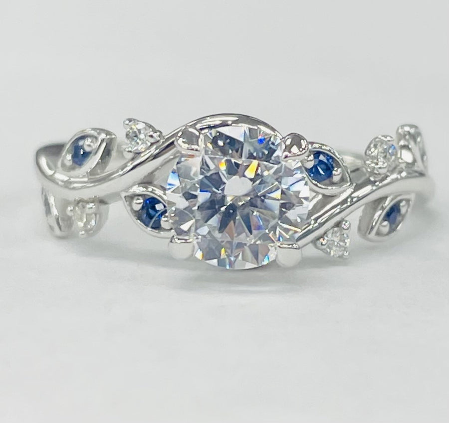 ArtCarved - Floral Inspired Diamond And Sapphire Setting