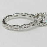 ArtCarved - Floral Twist Diamond Setting