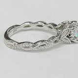 ArtCarved - Floral Twist Diamond Setting