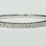 This stunning stackable ring features 10k white gold band wi...