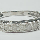 This stackable diamond ring is made of 10k white gold and wi...