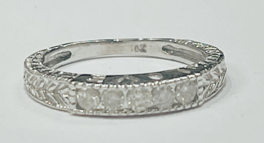 This stackable diamond ring is made of 10k white gold and wi...