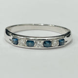 This stunning 14k white gold diamond and sapphire ring is pe...