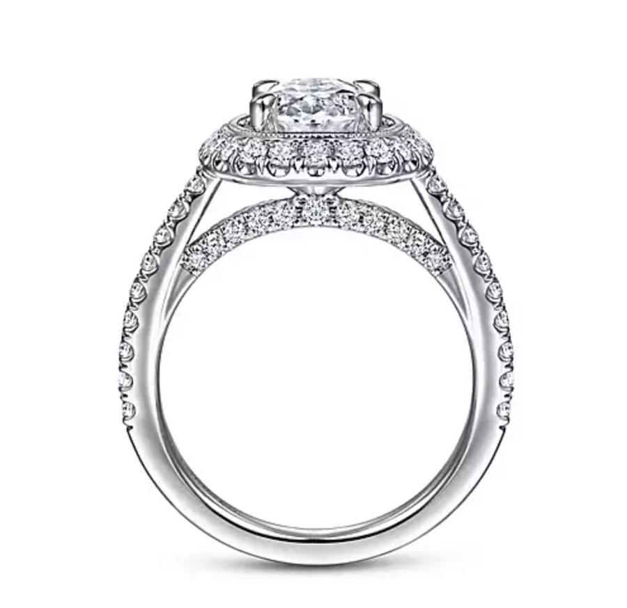 This oval cut engagement ring foregrounds your center stone ...
