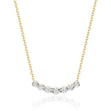 A yellow gold fashion graduated diamond necklace with a chain-link design and multiple graduated diamond pendants.