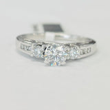 Three Stone Accented Diamond Engagement Ring